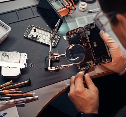 technician-carefully-inspect-the-internal-parts-of-the-smartphone-in-a-modern-repair-shop.jpg technician-carefully-inspect-the-internal-parts-of-the-smartphone-in-a-modern-repair-shop.jpg